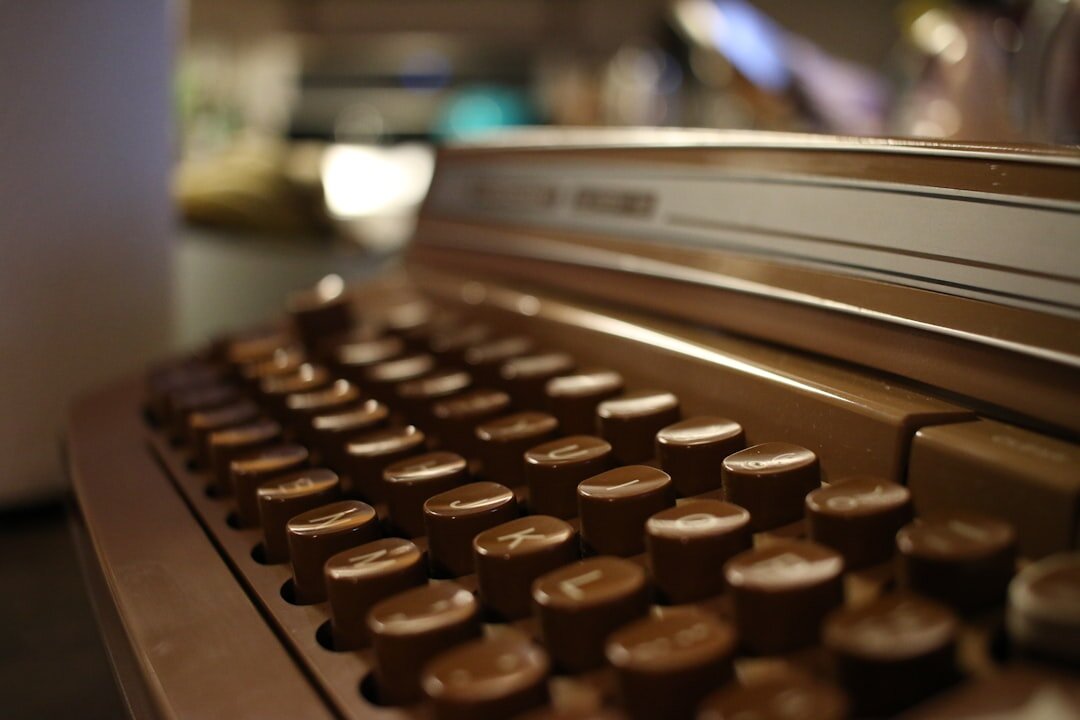 writer typing on typewriter
